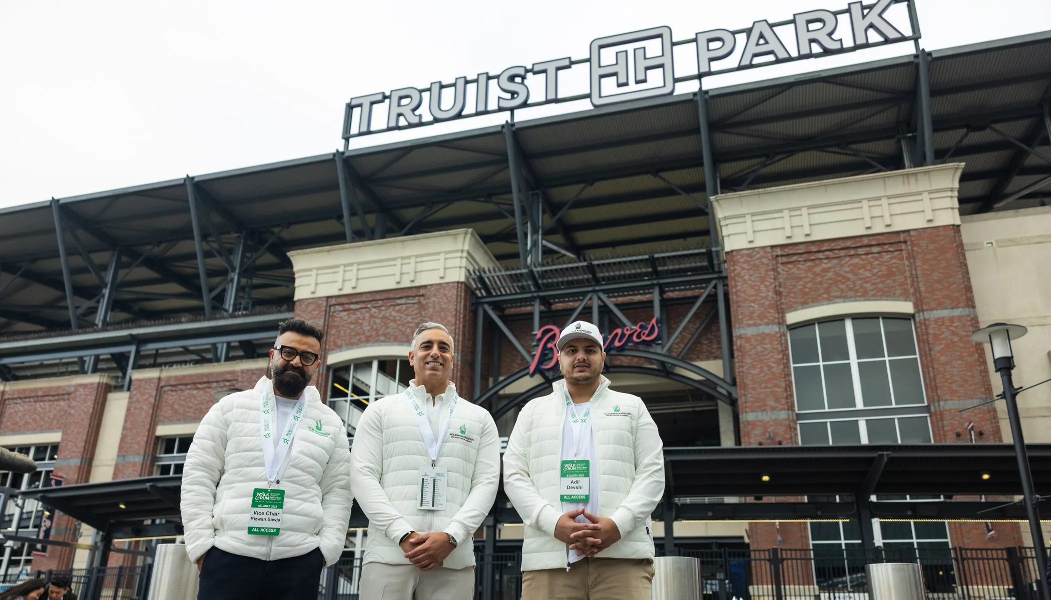 Aga Khan Foundation team members outside the Truist Park entrance